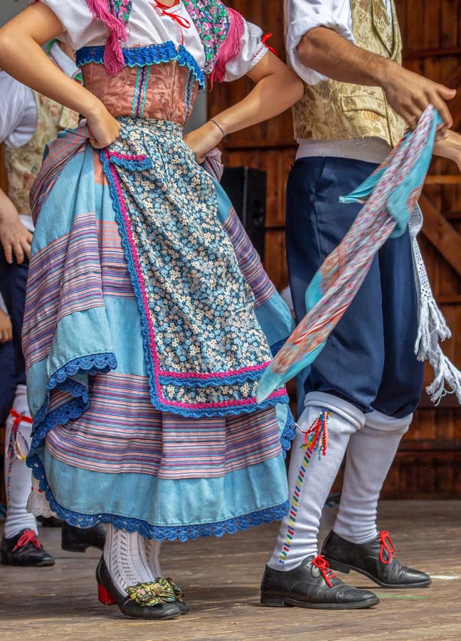 Detail of traditional folk costumes of Italian dancers